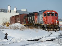 <b>Foreign Power</b> rarely makes it onto Local trains in Canada, but sometimes it does... witness this find in Brampton Ontario on the Glass Lead , GTW 4906 having point duty while boxcars are switched out of Zochem.