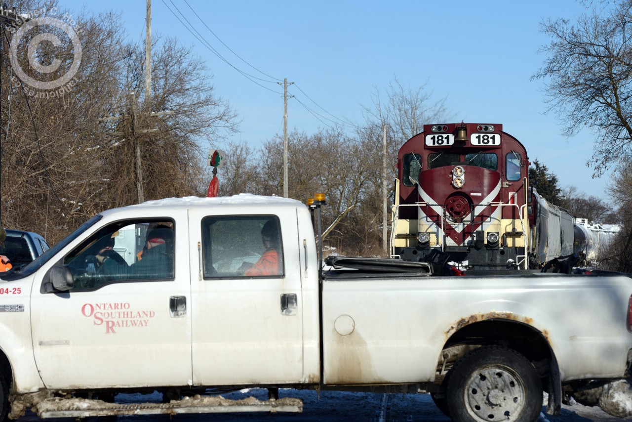 Crew Change for Ontario Southland Railway at GJR Lower Yard. A gaggle of employees discuss what's left to do as the crew truck picks up the outbound crew for a ride to Guelph Junction.