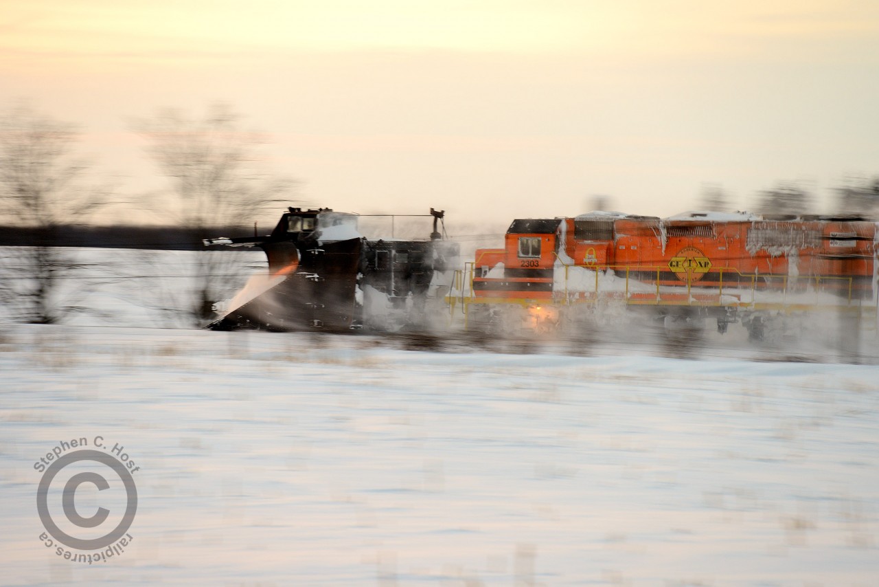 Luck was on my side when, on the way home from work you see a plow train about to wye in your hometown. As a photographer, I think to myself how fast can you get home, get the camera and get somewhere to bag it? Well with 3 minutes to spare I made it to Mosborough to try my hand at a pan shot, about the only option at sunset available to you.