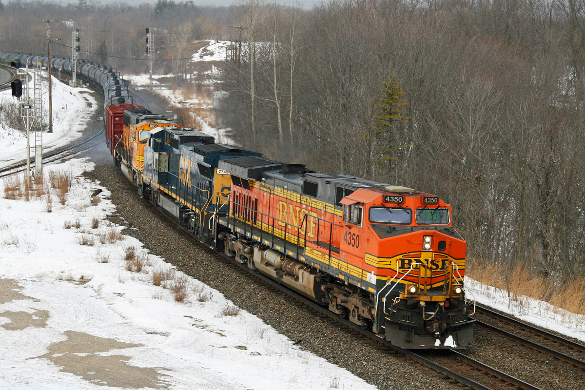 A trio of foreign power leads CN U710 off the Dundas Sub at old Hamilton West.