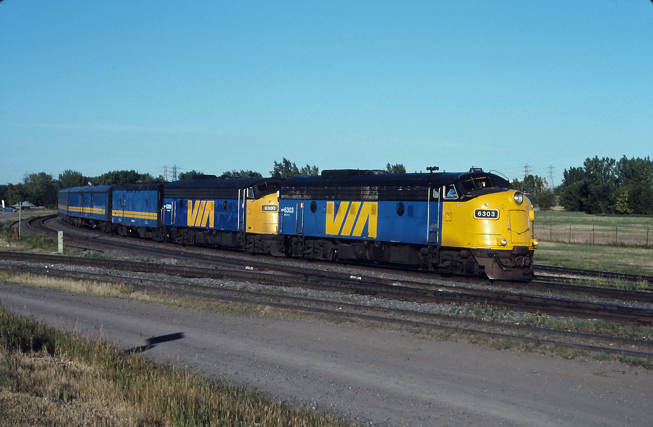 On the home stretch; VIA #692 from Churchill rolls through Portage Junction, on the approach to its final stop in Winnipeg.