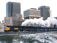 VIA 6532 and VIA 6618 lead a westbound passenger extra into the Winnipeg Station on a frigid October afternoon. 