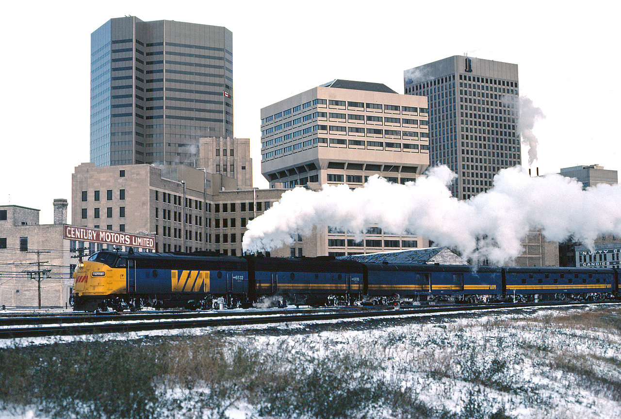 VIA 6532 and VIA 6618 lead a westbound passenger extra into the Winnipeg Station on a frigid October afternoon.
