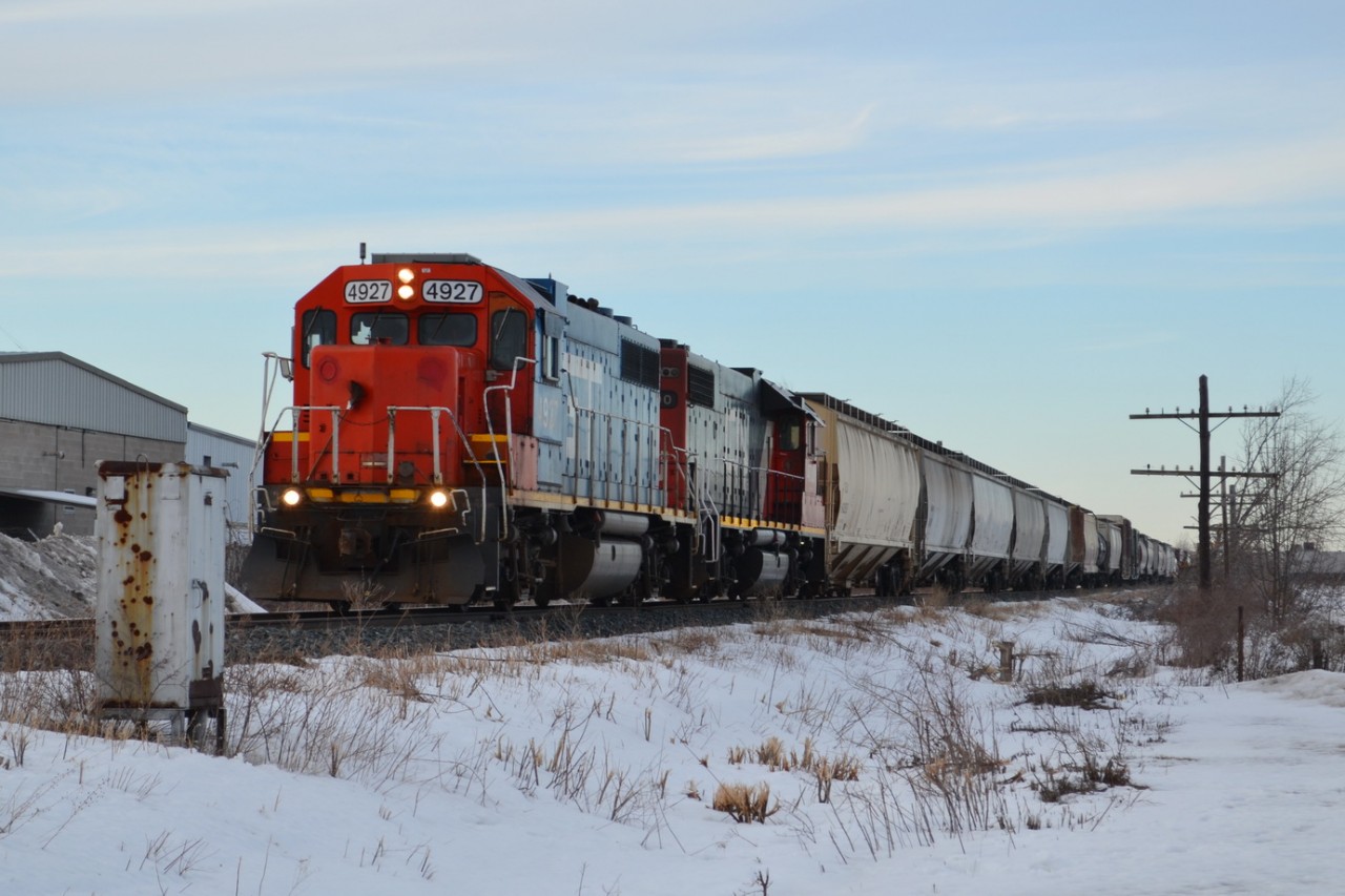 GTW 4927 & CN 4700 lead a very slow train down the old C&O Canadian Division. You can see an old signal Box left abandon along the line near the Windsor Airport & City of Windsor Fire Station #8.