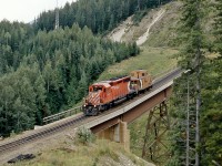 Another view of Mountain Creek Bridge with SD40-2 CP 5591 making a "caboose hop" down the grade