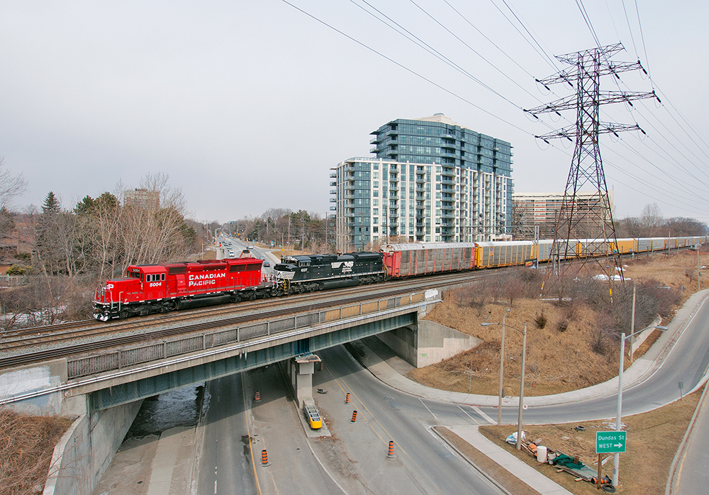 Diverging onto track one for a meet with a dimensional train, a rebuilt SD30C-ECO leads a London built SD70ACe on train 147.
