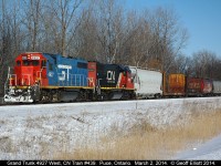 A rare catch as blue Grand Trunk GP38-2 #4927 leads CN train #439 down the VIA Chatham Subdivision on a sunny, but cold, March 2nd, 2014 day.  Sad to see all the old predecessor railway schemes fade off into oblivion, but nice to catch one while they still exist!!
