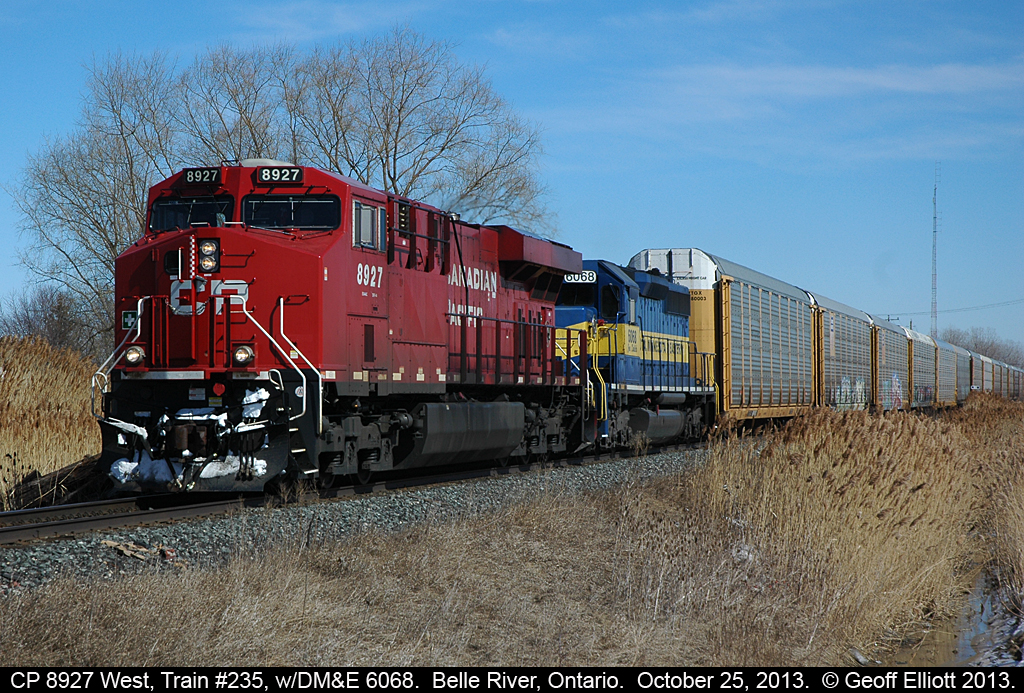 CP 8927 leads DM&E 6068 as train 235 flies through Belle River, Ontario on March 17th, 2014.  8927 has a clearance all the way to Begin/End CTC Sign Walkerville, and is wasting no time getting there!!