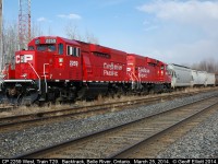 CP Train T29-25, having run out of time due to MOW crews working on the main between Tilbury and Chatham, ties up on the back track in Belle River on March 25th, 2014.  The train was to be lifted by a westbound later that evening, however this plan changed as the crew didn't want to make all the moves necessary to make the lift out of the back track.  The RTC agreed and as a result T29 was called at 0700 on the 26th and crewed the train in Belle River.  They then proceeded to Windsor, dropped the cars in the photo, made their lift and headed back to Chatham.  Ironically they didn't make it back on the 26th either and ended up in the same place you seem them here.....