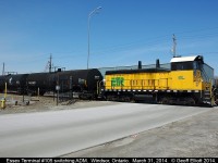ETR 105 shoves a cut of tanks into the large ADM facility in Ojibway, just south of Windsor, on a beautiful March spring day.