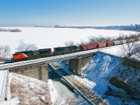 Overlooking the ice covered harbour, CN 331 slowly pulls after working Hamilton.