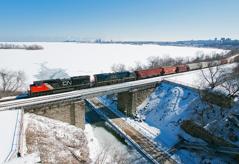 Overlooking the ice covered harbour, CN 331 slowly pulls after working Hamilton.