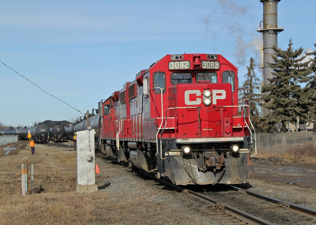 GP38-2's CP 3082 and 3034 switch tank cars at CP's Clover Bar Yard