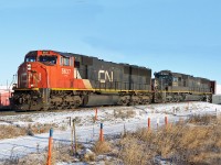 SD75I CN 5637 and SD70 IC1011 head west through Clover Bar approaching Edmonton.  CN 5637 is no longer on the roster having been retired in January 2012 after being hit by runaway coal cars near Hinton.