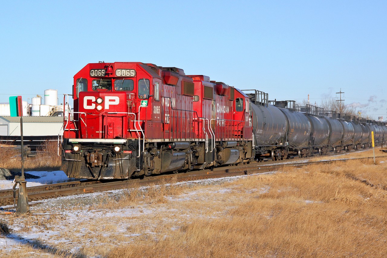 GP38-2 CP 3065 and 3131 head South on CP's Scotford Sub at 34th St.