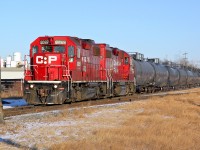 GP38-2 CP 3065 and 3131 head South on CP's Scotford Sub at 34th St.