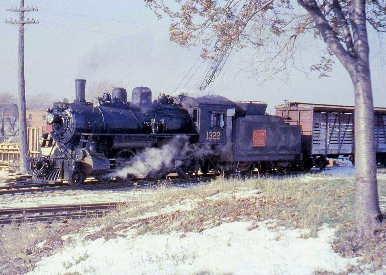 Canadian National "Ten Wheeler" 1322 pauses at Meaford before returning to Collingwood, on CN's Meaford Subdivision in 1958.1322, an H6c class Mikado, was built in 1910 for the Canadian Northern Railway. It was donated to the City of Barrie in 1960 (after being renumbered 1531) and survives today owned by the Simcoe County Museum in Midhurst, ON.[Editor's notes: Operations on CN's Meaford Sub, which originally ran 52 miles to Meaford from Barrie, were transferred when Barrie and Collingwood both stepped in to buy portions of the line in 1996 when CN wanted to abandon it. It is now part of the Barrie Collingwood Railway, with operations contracted to Cando. However, in 2011 Collingwood decided to discontinue rail service over their portion of the line from the CPR interchange at Utopia to Collingwood. The Barrie section of the former Meaford Sub remains active].Note, geotagged location not exact.