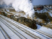 The CN Stratford Wayfreight with 2-8-2 Mikado 3422 leaves Sarnia on December 1958. It would head up the now-removed Forest Subdivision at Sarnia Junction (just behind us, to the east of Indian Road) and on to Stratford.