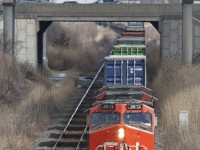 CN 2613 leads this Q series stack west to BIT
