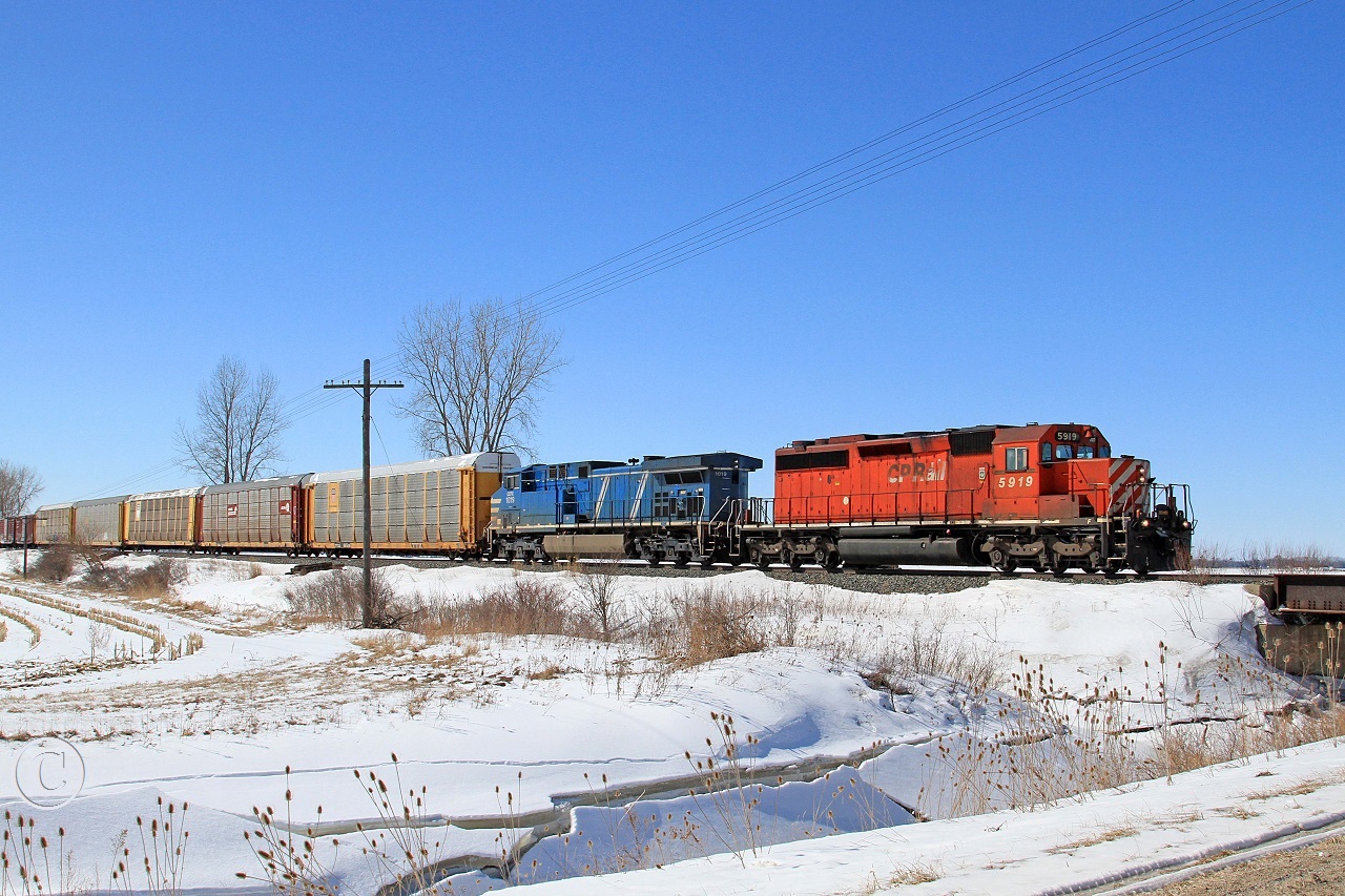 A scruffy CP 5919 with CEFX 1019 lead train 234 eastward at mile 76.06 on the CP's Windsor Sub.
