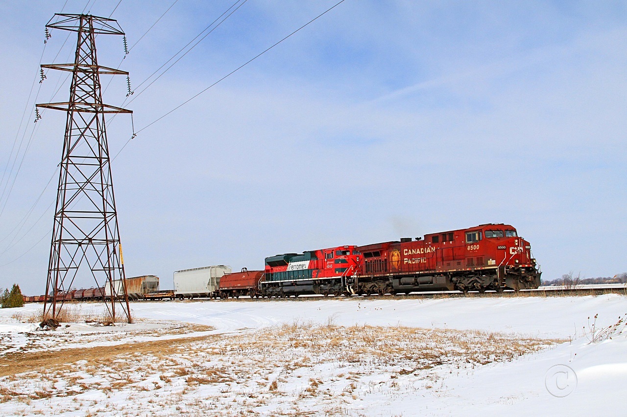 CP 8500 with FXE 4045 power train 242-13 eastward at mile 90.8 on the CP's Windsor Sub.
