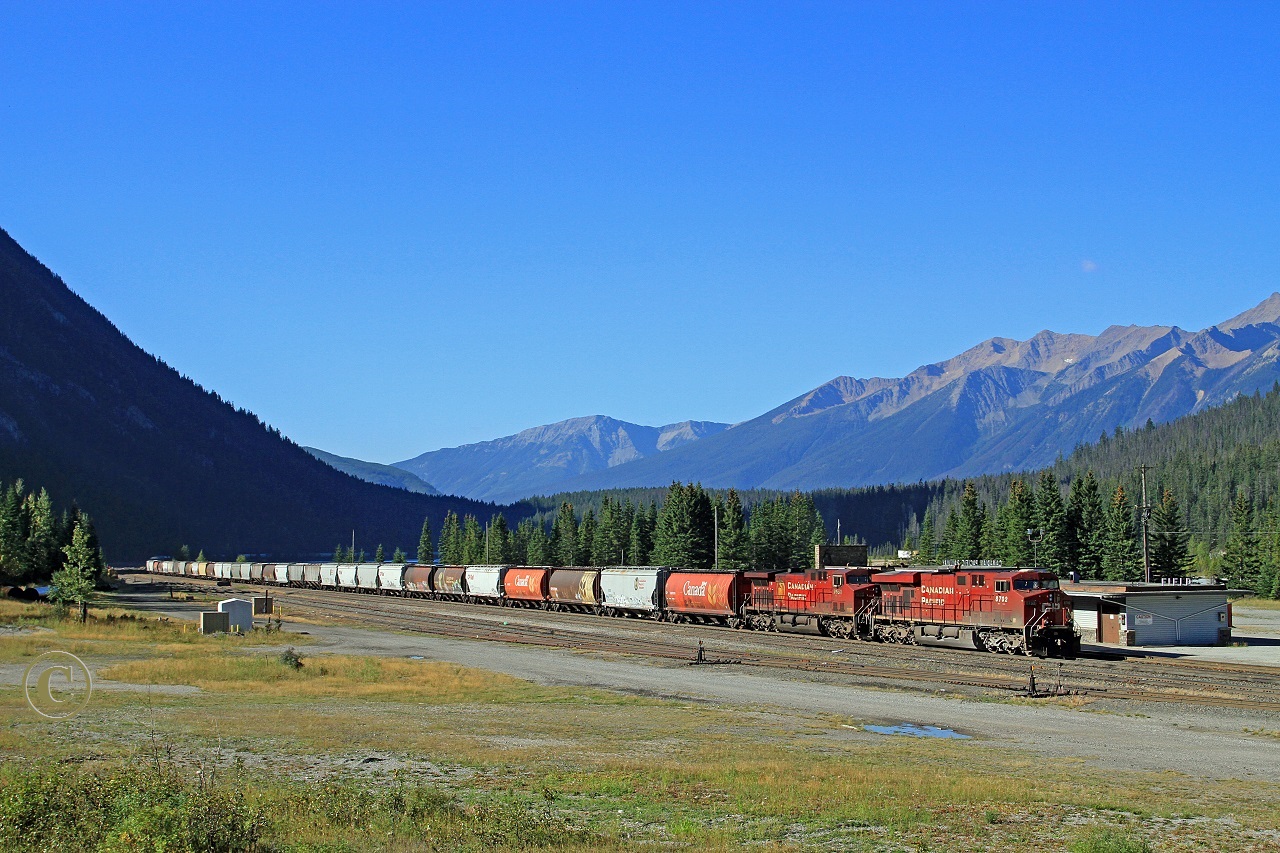 Waiting on a crew change at Field, CP 8702 and 9658 will be in charge of grain empties heading east over the Laggan Sub to Calgary.