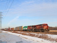 CP 9611-240, with CP 9807 and GO 661, is eastbound at mile 98.8 on the CP's Windsor Sub. Motive Power Inc./Wabtec at Boise swapped out GO's EMD 16-cylinder EMD 710GB prime movers on the MP40PH-3Cs with two Cummins QSK60s. 