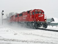 Running short on time, the crew has the whip to CP 6228 and 6251 as they hammer by the west switch of Colborne siding. Ahead lines one meet (241 at Roblindale with CP 8548 and SOO 6027), where 142 will grudgingly take the siding, then a straight shot all the way to Smiths Falls. 1329hrs.