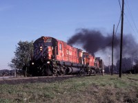 Eastbound ALCOs smoking it up in Woodstock.