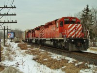 CP 6007, 5926 & 5872 shove a cut of autoracks they picked up in Detroit into Windsor yard.