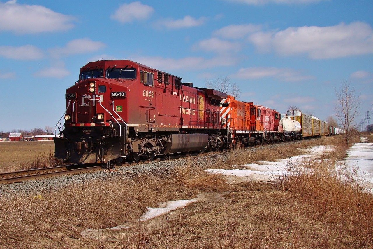 CP 8648 leads today's 240 with two GP9's in tow, presumably for the scrapper. CP 1690 was built as TH&B #403 in 1954 at GMD and was incorporated into CP colours in Feb of 88.