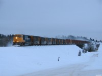ONT 2101 North working on 213's daily freight from Englehart to Cochrane, with work at Iroquois Falls, highballs past the prison located beside ONR's Ramore sub 79.3 miles from Englehart, just off of Highway 11! 