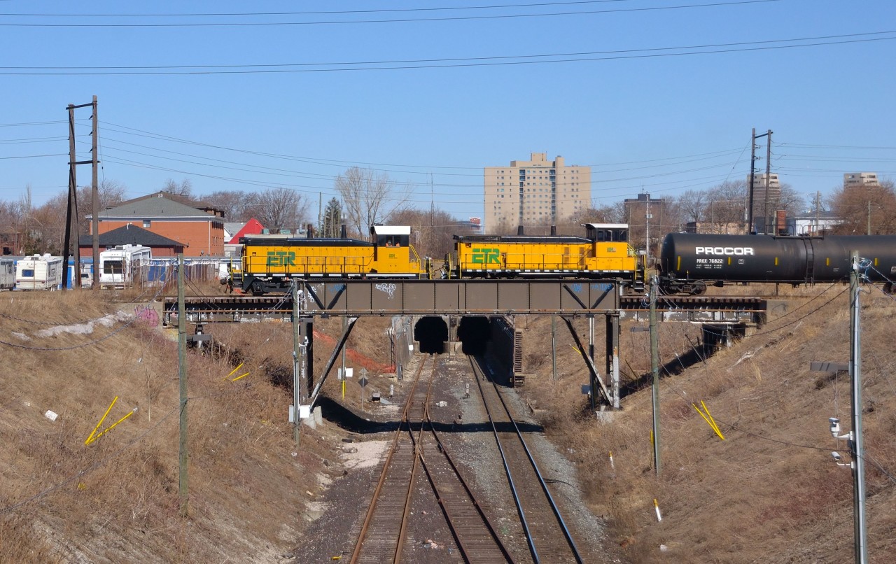 ETL 104 & 107 haul their train westbound towards Ojibway as they cross over the Windsor/Detroit rail tunnel.