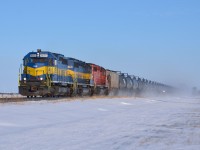 CP 641 led by DME 6055-ICE 6419-CP 5957 churns up the snow as it heads westbound thru Haycroft on its way towards Walkerville.