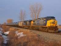 CP 640-024 passes eastbound thru Jeannette mile in the early morning sun sporting CSXT power on its way towards London.