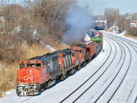 CN 527 with CN 9639, CN 4134 & CN 7062 head west through Montreal West on the transfer track. For more train photos, click <a href=http://www.flickr.com/photos/mtlwestrailfan/>here.</a>