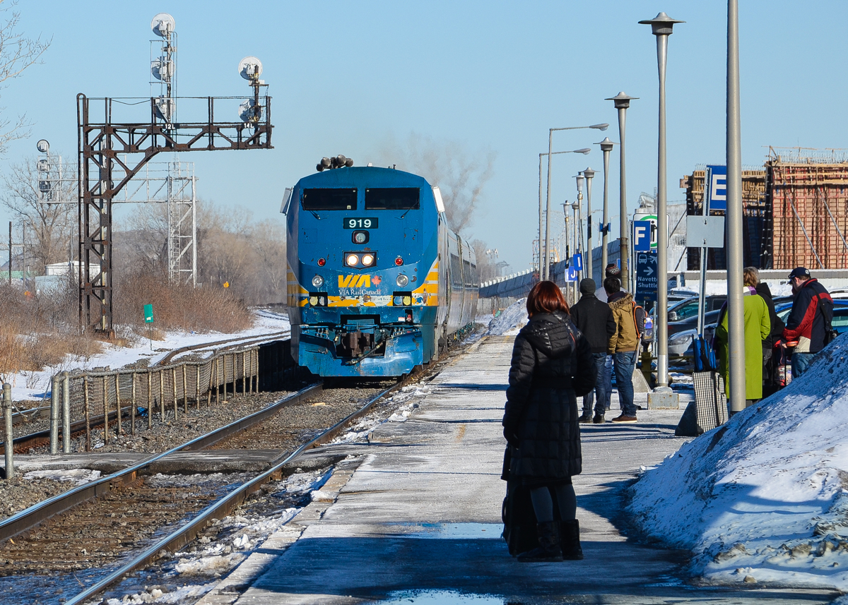 Passengers await the arrival of VIA 57, about to make its stop at Dorval. For more train photos, click here.