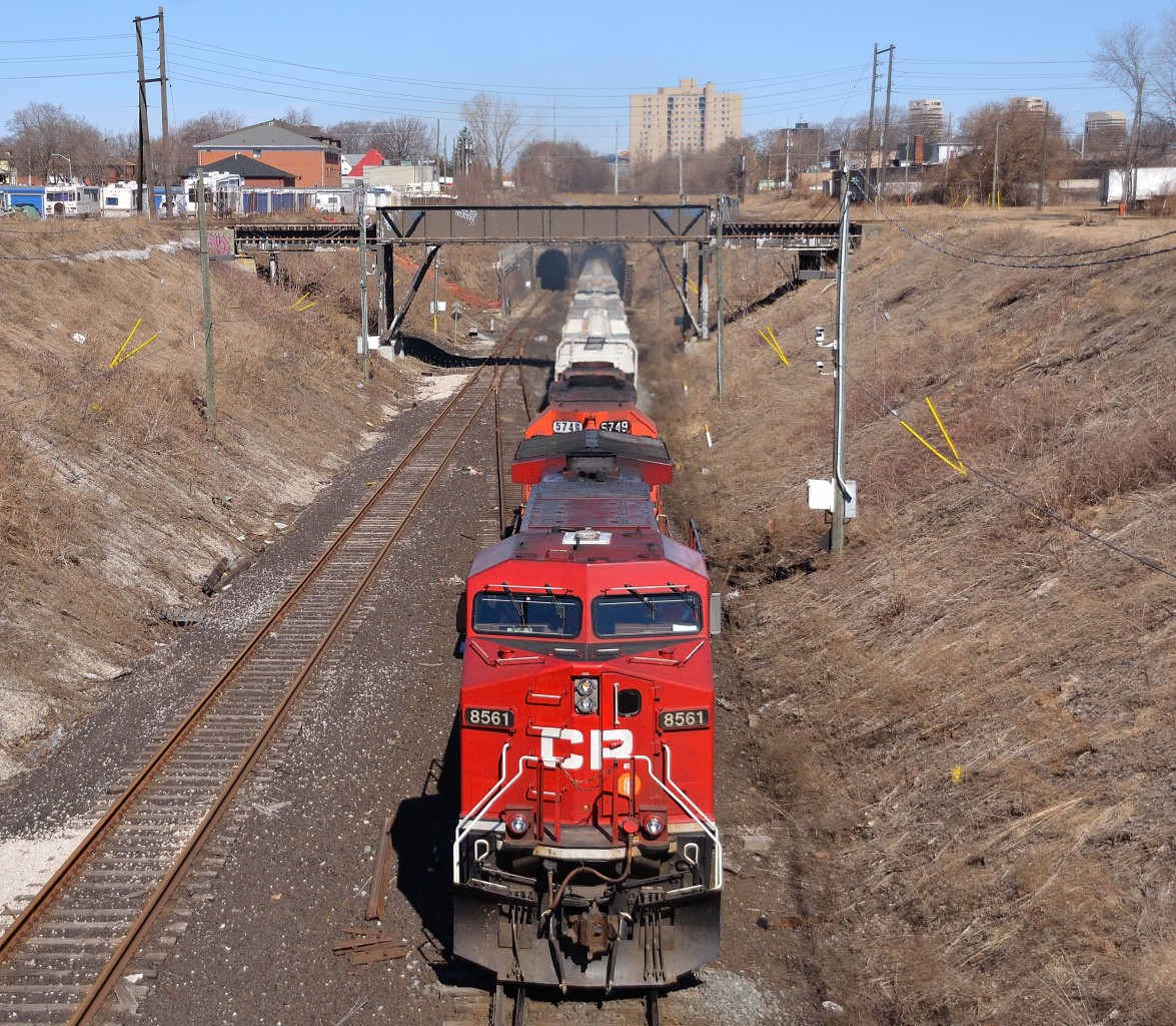 CP 242 charges out of the Detroit-Windsor tunnel on it's way into Windsor led by CP 8561