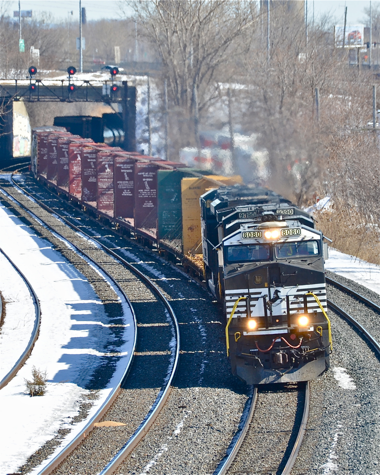 Another late CN 529 with three NS units (NS 8080, NS 9390 & NS 1094) heads west towards its terminus of Taschereau Yard. For more train photos, click here.