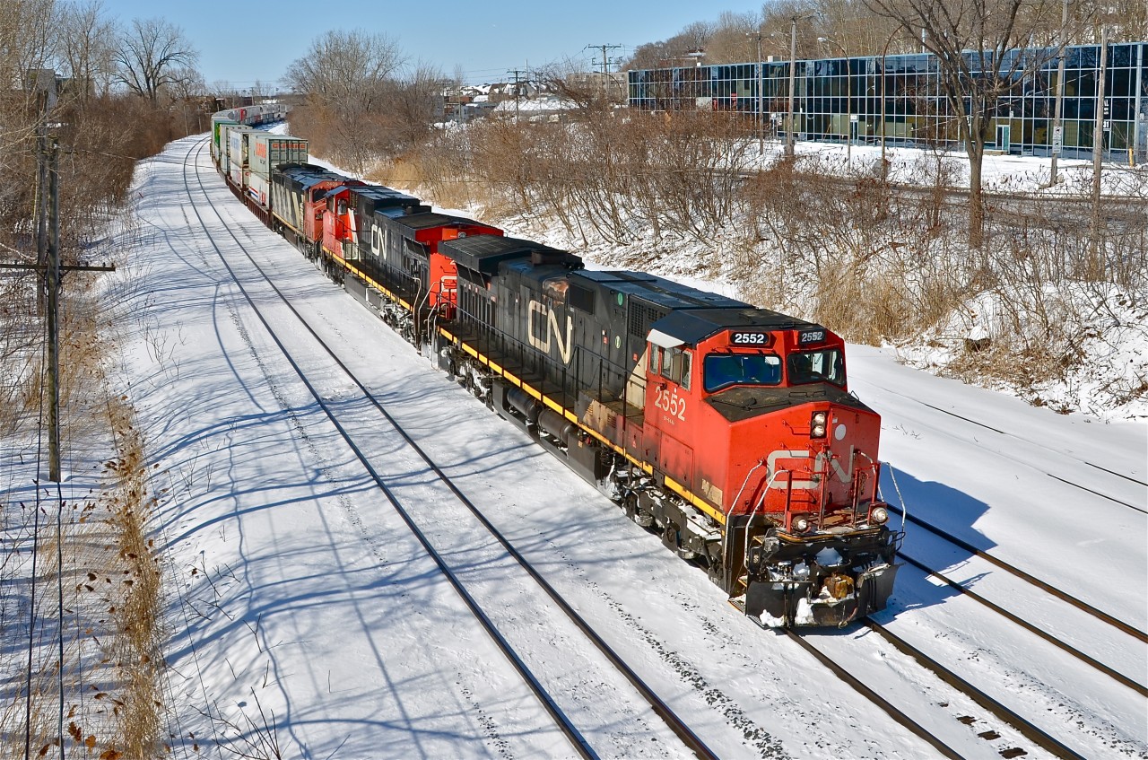CN 2552, CN 2613 & CN 2409 head east with CN 120 on a crisp winter day (in temperature if not in season). Thirty second later CN 710 would pass eastbound as well. For more train photos, click here.
