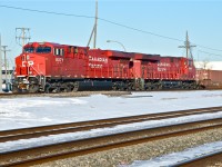 A pair of newer ES44AC's (CP 9371 & CP 8945) are stopped slightly east of the AMT Dorval Station with CP 143. They will depart in a few minutes once AMT 19 passes. For more train photos, click <a href=http://www.flickr.com/photos/mtlwestrailfan/>here.</a>