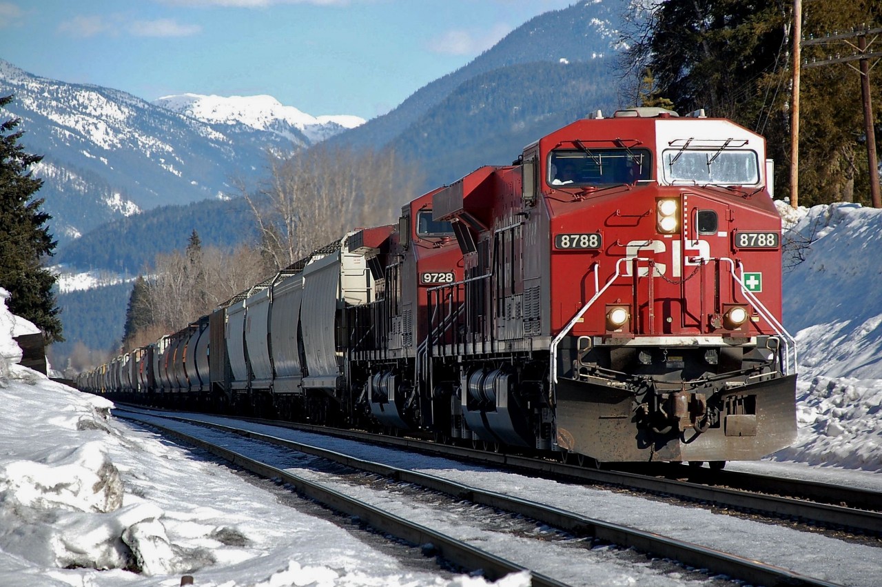 CP nos.8788 & 9728 are hauling a load of potash westwards through Malakwa.