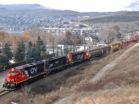 CN(WC)3026 is the lead unit on this eastbound freight as it runs alongside Kalamalka Rd. in the District of Coldstream.