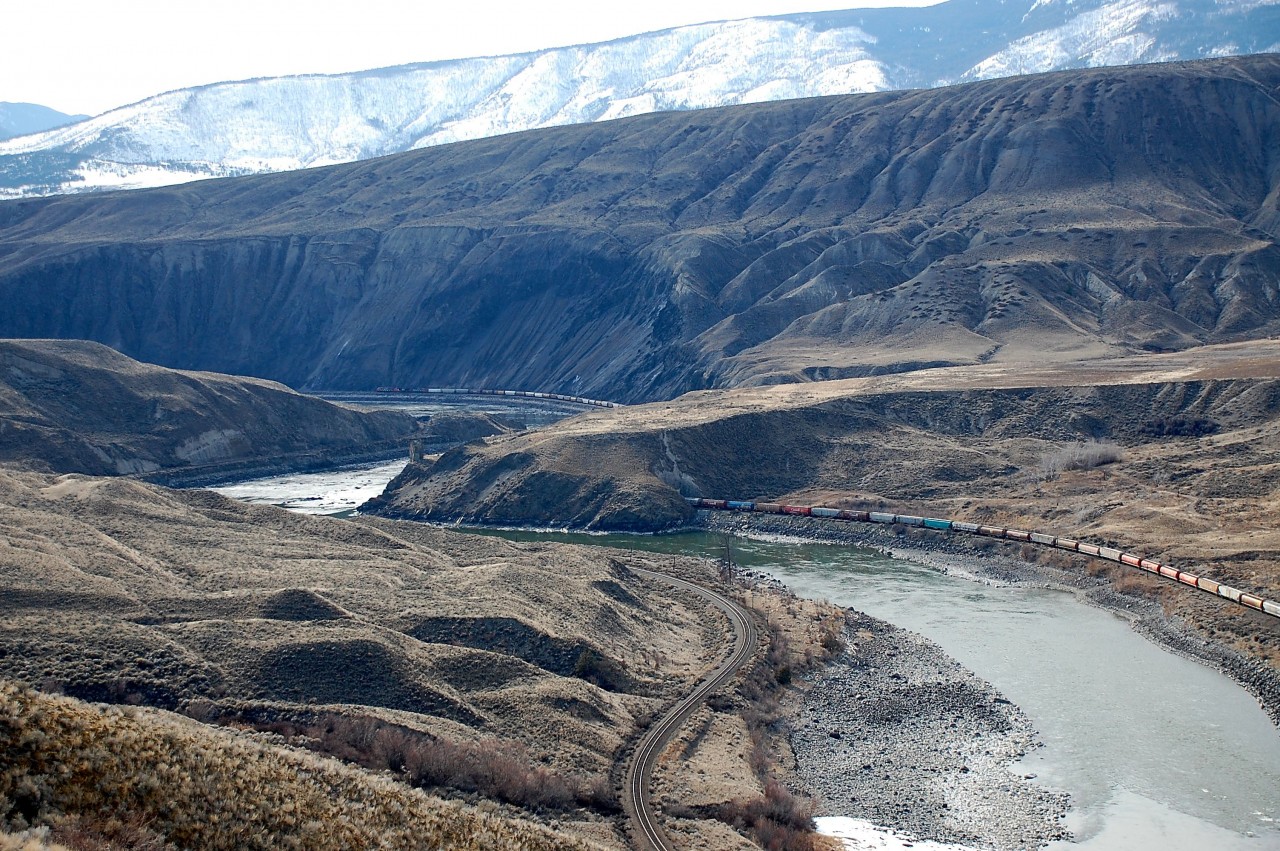 Three CN units are in charge of this load of grain as it heads westwards towards Black Canyon on the Thompson River.