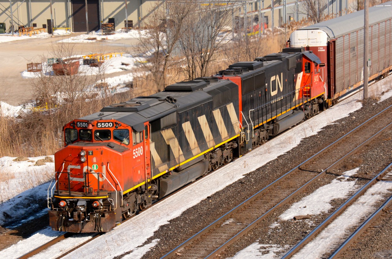 CN5500 and CN5413 head for the St. Clair River tunnel to Port Huron, Michigan from the Indian Road overpass in Sarnia.