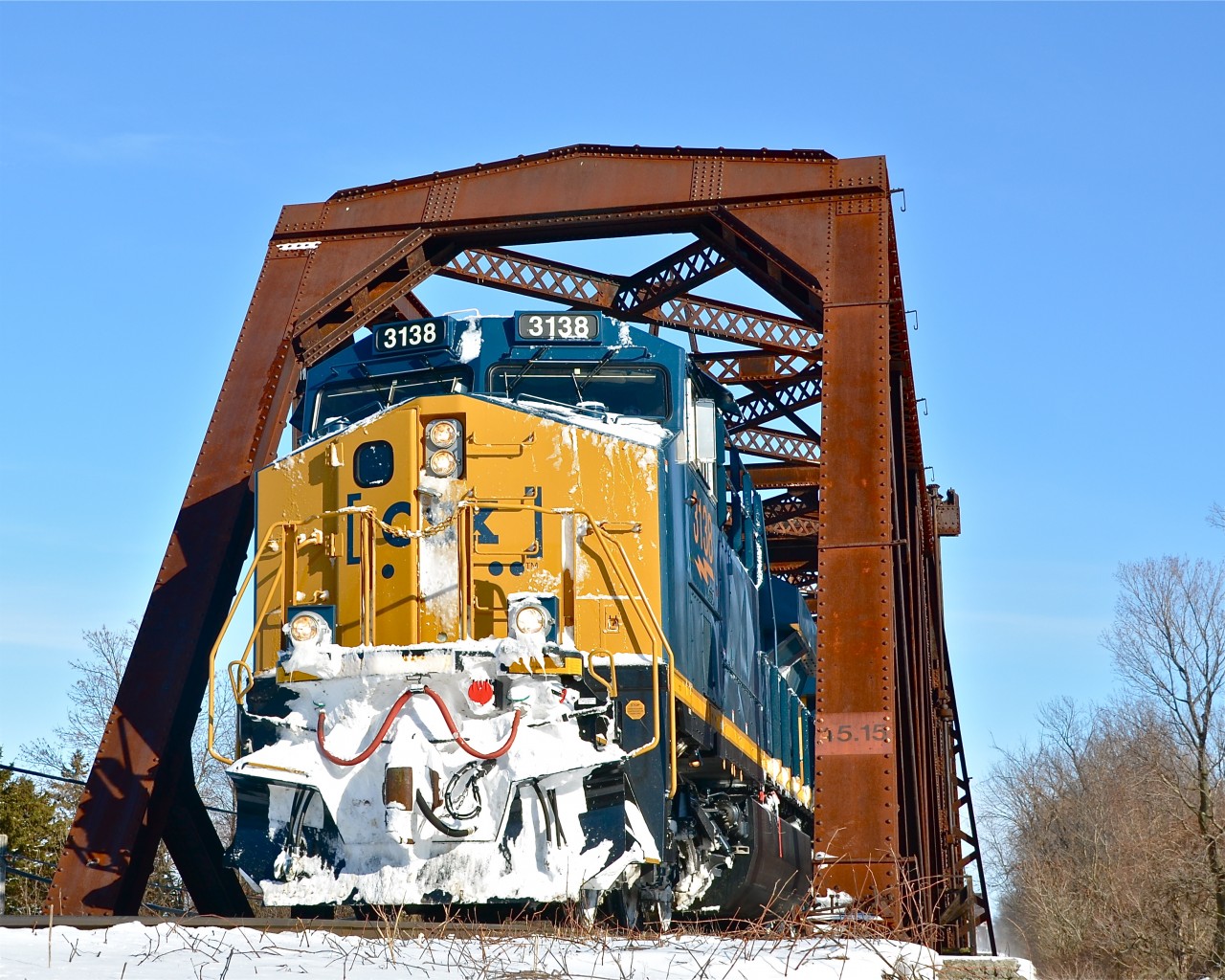 CN 326 (with CSX 3138 & CSX 813 as power) crosses the Soulanges canal on its way to Montreal. For more train photos, click here.