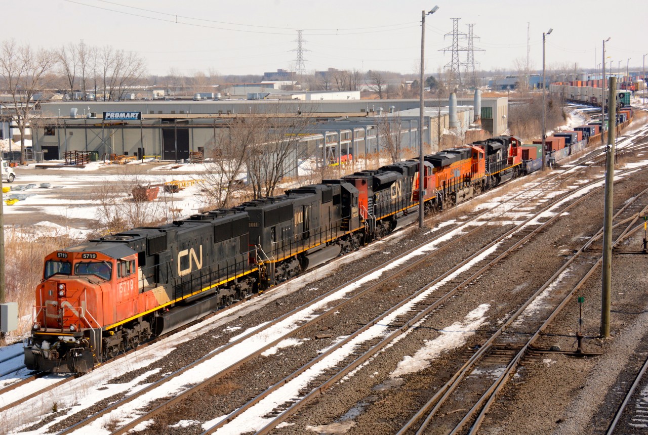 CN5719 heads west bound at the Indian Road overpass with IC1011, CN8885, BNSF6590 and CN8832.