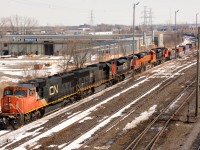 CN5719 heads west bound at the Indian Road overpass with IC1011, CN8885, BNSF6590 and CN8832.