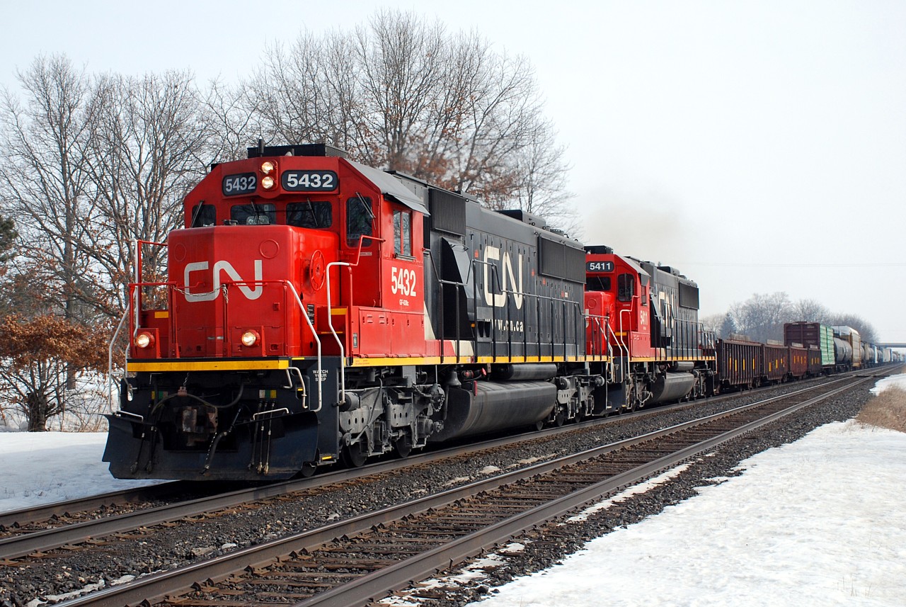 CN 385 is back up to track speed after crawling up the grade through Hardy with CN 5432 and 5411.