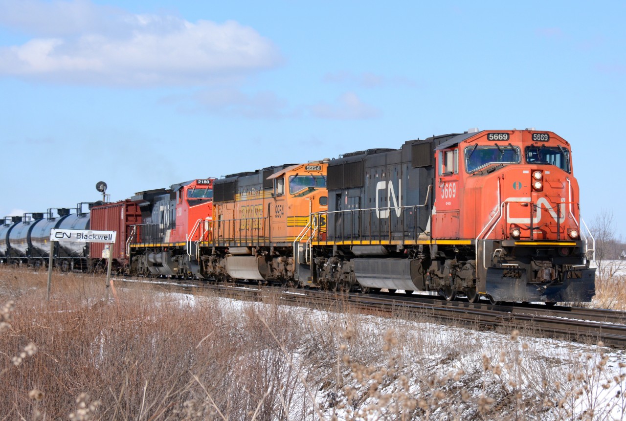 CN5669 with BNSF9954 and CN2180 heading east bound from Sarnia.